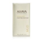 Das Bild zeigt eine feste Gesichtsseife in einer Papierverpackung mit der Aufschrift: "AHAVA"